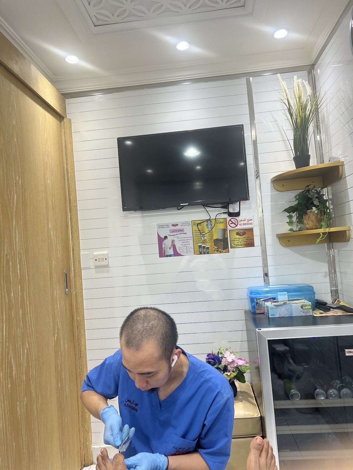 A therapist performing a pedicure